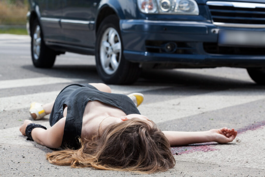 A lady unconscious on the ground